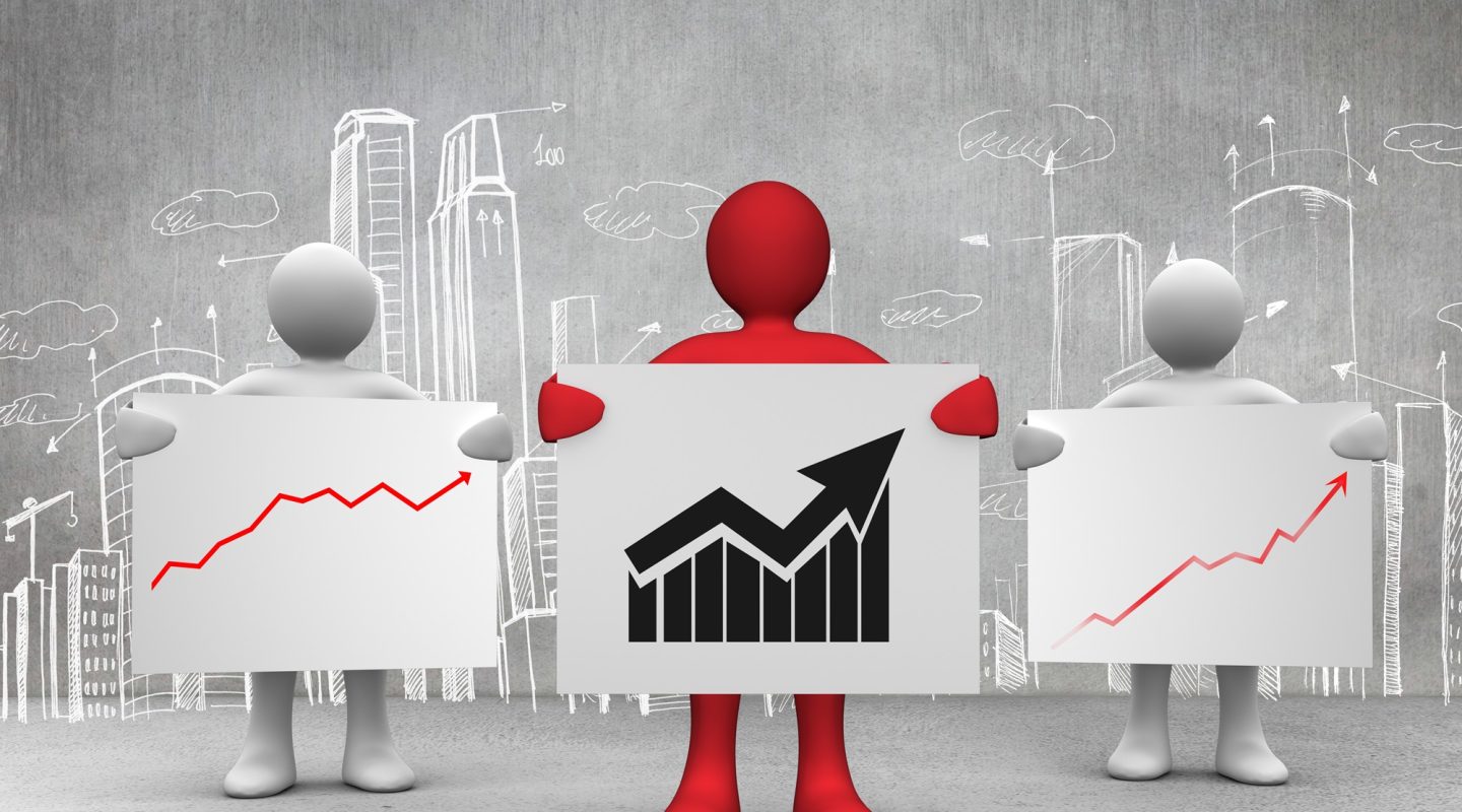 composite of figures holding upward graphs over city background